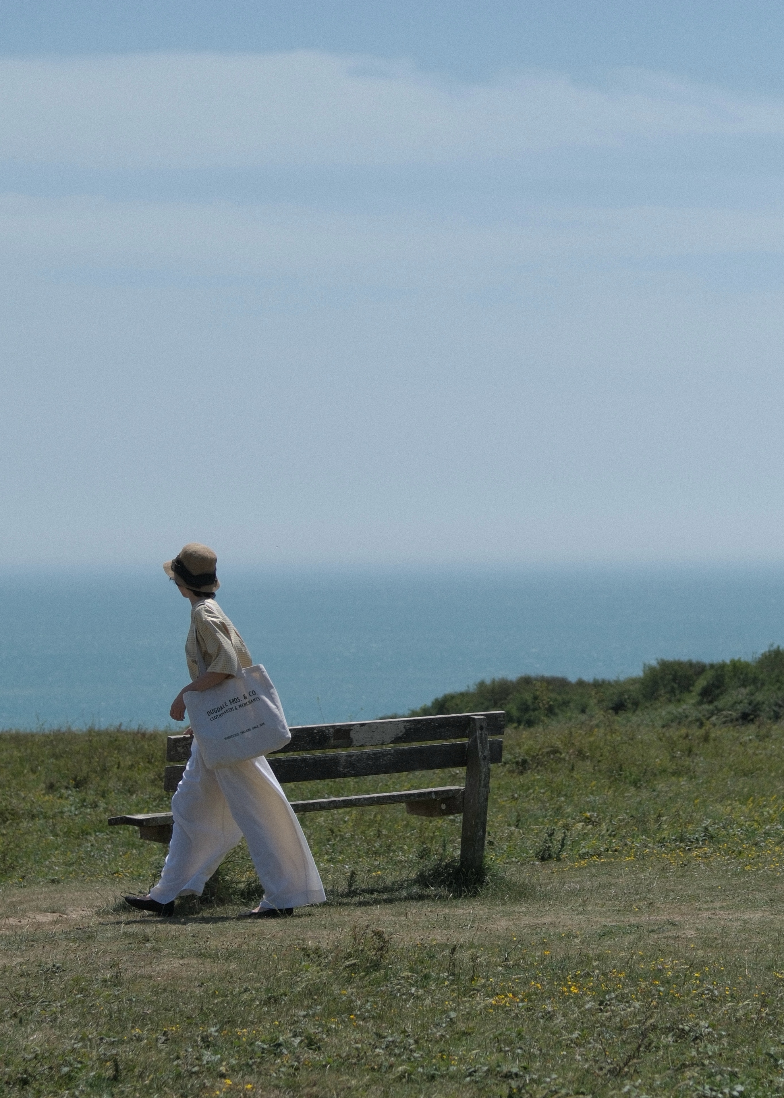 Cirrus Wide Leg Trousers — Side, Walking
